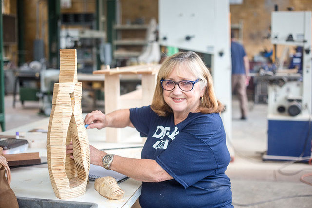 Debi Barry, U.S. Air Force veteran, works on a sculpture project.